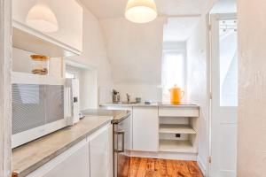 Kuchyňa alebo kuchynka v ubytovaní L'Oasis - Chaleureux duplex - Centre Ville de Caen