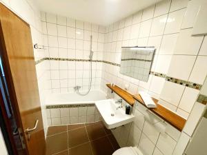 Koupelna v ubytování EasyOne Apartments