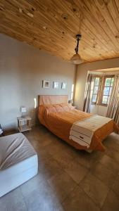 Postel nebo postele na pokoji v ubytování Cabañas El Fuerte + 26 fotografií