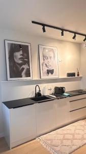 Kuchyňa alebo kuchynka v ubytovaní ONE Apartament WROCŁAW