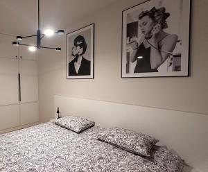 Posteľ alebo postele v izbe v ubytovaní ONE Apartament WROCŁAW