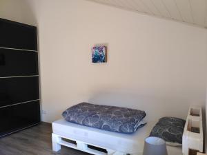 Postel nebo postele na pokoji v ubytování Strandurlaub am Felsenmeer