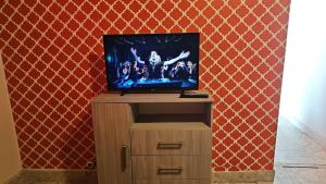 TV a/nebo společenská místnost v ubytování Cassanova IV