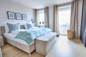 Postel nebo postele na pokoji v ubytování Techts Apartmenthaus