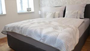 Postel nebo postele na pokoji v ubytování Rosenwinkel Appartement im EG