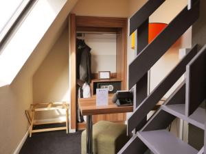 TV a/nebo společenská místnost v ubytování Best Western Hotel Atrium Valence