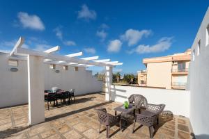 En balkon eller terrasse på Baia Verde Apartment