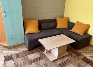 Posezení v ubytování ALPHA family HOTEL