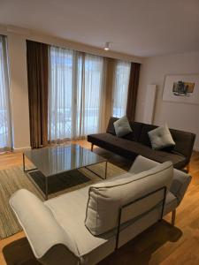 a living room with a couch and a table at BFlatz in Istanbul