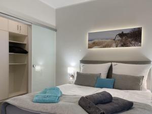 a bedroom with a bed with two pillows on it at Ferienwohnung Kleine Auszeit in Neuhaus
