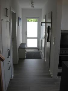 Postel nebo postele na pokoji v ubytování Ferienhaus Twistesee 93