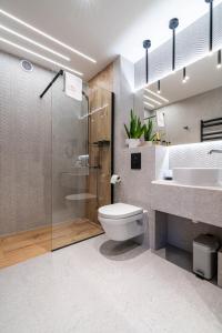 Phòng tắm tại Dasto Jacuzzi Old Town Cracow
