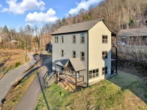 an overhead view of a house with a porch at Honeybear Hideaways - Luxury Gatlinburg Smoky Cabin with Indoor Pool and Hot Tub in Gatlinburg