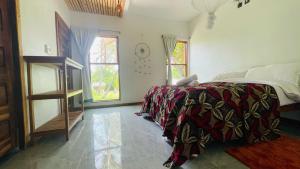 Letto o letti in una camera di CosyBe Villas