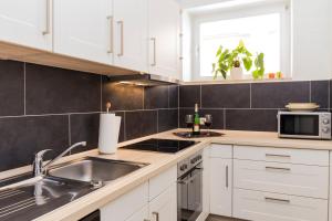 Kuchyň nebo kuchyňský kout v ubytování Wohnung Bauernhaus 1