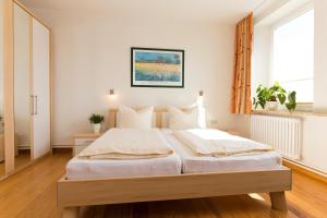 Postel nebo postele na pokoji v ubytování Wohnung Bauernhaus 1