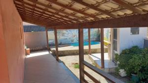 an outside view of a house with a patio at Alugo para Carnaval in Araruama