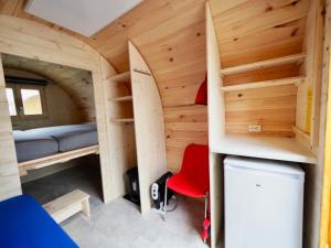 Postel nebo postele na pokoji v ubytování Holzhütte J08 klein