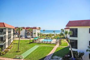 an aerial view of a resort with a swimming pool and the ocean at Breathtaking Gulf Views Sandalfoot Condo Sanibel Island 3A3 in Sanibel