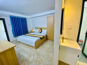 EaPuk Motel客房内的一张或多张床位