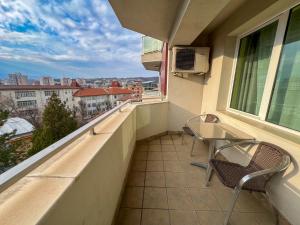Balkón nebo terasa v ubytování ALPHA family HOTEL