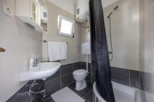 Koupelna v ubytování Apartman Štorija + 72 fotografií
