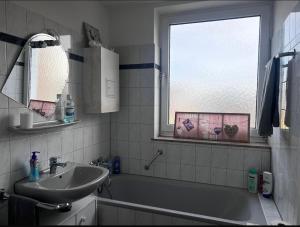Ένα μπάνιο στο Vida Real Estate Stein