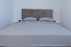 Ένα ή περισσότερα κρεβάτια σε δωμάτιο στο Apartman Sara