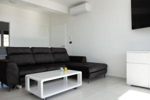 Χώρος καθιστικού στο Apartman Sara