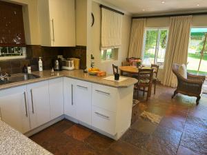 Køkken eller tekøkken på GRACE COTTAGE Charming 2 Bed en-suite Cottage with Solar