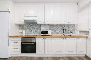 Diáfano, amplio y luminoso by CABANA Rentalsにあるキッチンまたは簡易キッチン