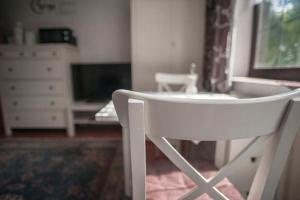 Μια τηλεόραση ή/και κέντρο ψυχαγωγίας στο Waldgasthof Röckers-Appartement 4