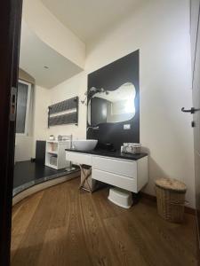 TV a/nebo společenská místnost v ubytování Enea Guest House