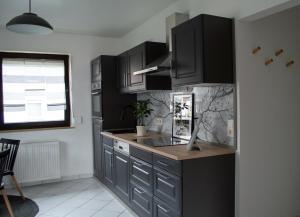 Kuchyň nebo kuchyňský kout v ubytování Ferienwohnung Kurz "Weinbergblick"