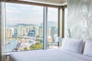 Cama o camas de una habitación en W Hong Kong