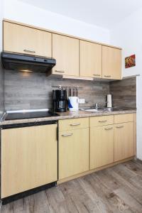 Kuchyň nebo kuchyňský kout v ubytování Ferienwohnungen Haus Boje "Wattwurm"