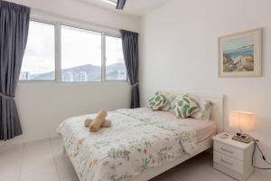 Ένα ή περισσότερα κρεβάτια σε δωμάτιο στο Good Seaview, Vacation Home +15 φωτογραφίες