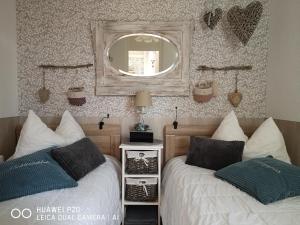 Postel nebo postele na pokoji v ubytování NaturLiebeHarz + 17 fotografií