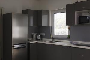 Kuchyň nebo kuchyňský kout v ubytování Palm Crest Curacao 151B
