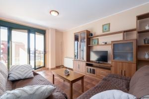 TV a/nebo společenská místnost v ubytování Confort a pie de playa by CABANA Rentals