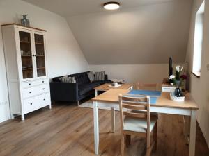 Posezení v ubytování Ferienwohnung Vogels Mühle