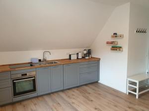 Kuchyň nebo kuchyňský kout v ubytování Ferienwohnung Vogels Mühle + 4 fotografie