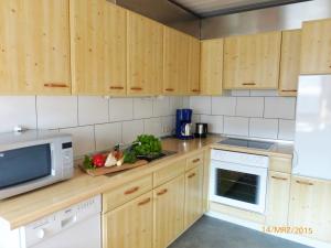 Kuchyň nebo kuchyňský kout v ubytování Ferienwohnung Heimatliebe + 17 fotografií