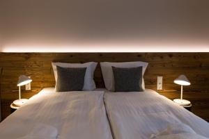 Katil atau katil-katil dalam bilik di Alm-Chalet Exclusive 5