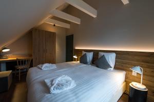 Katil atau katil-katil dalam bilik di Alm-Chalet Exclusive 5