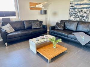 Posezení v ubytování Ferienhaus Sundowner FH6