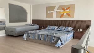 Voodi või voodid majutusasutuse Saint Sebastian Flat 306 - Com Hidro! até 3 pessoas, Duplex, no centro toas