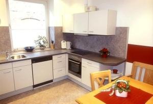 Kuchyň nebo kuchyňský kout v ubytování Wohnung Bauernhaus 2