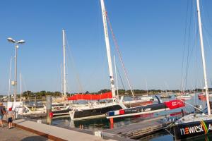 a group of boats docked at a marina at Appartement à la Trinité sur Mer in La Trinité-sur-Mer