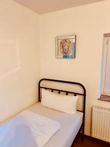 Postel nebo postele na pokoji v ubytování Pension Eichel